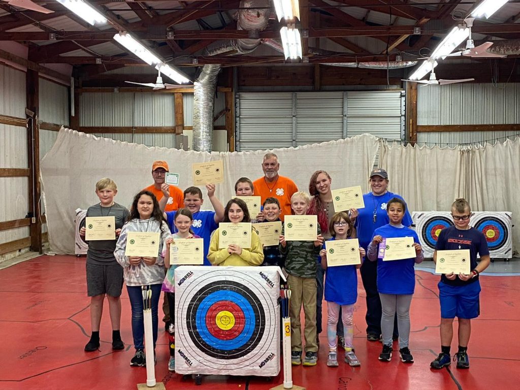 youth participating in archery