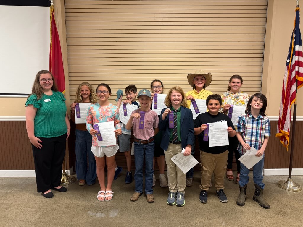 Youth showing 4-H ribbons