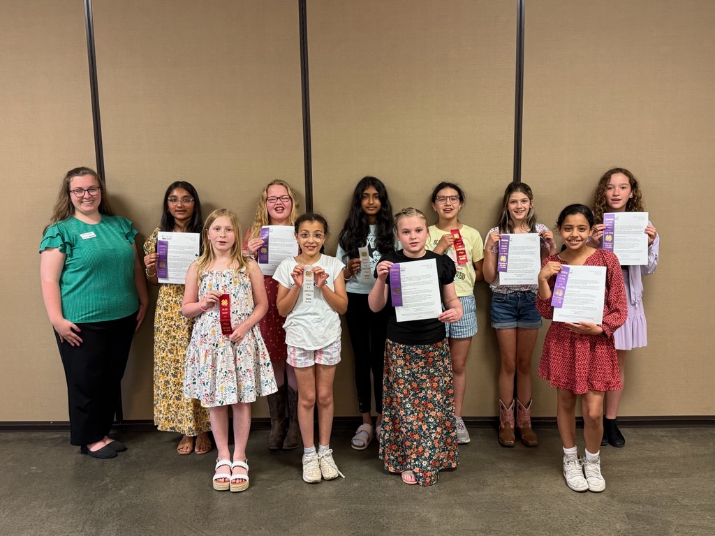 youth showing 4-H Blue Ribbons